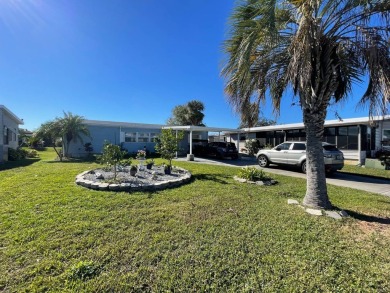Swiss Golf & Tennis 55+ Community - 2 Bedroom, 2 Bath Home - on Lake Henry Golf Club in Florida - for sale on GolfHomes.com, golf home, golf lot
