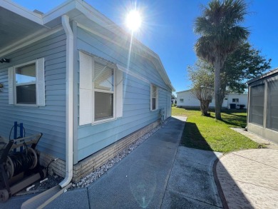 Swiss Golf & Tennis 55+ Community - 2 Bedroom, 2 Bath Home - on Lake Henry Golf Club in Florida - for sale on GolfHomes.com, golf home, golf lot