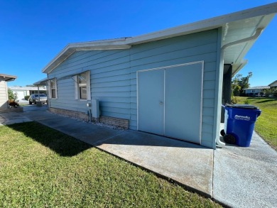 Swiss Golf & Tennis 55+ Community - 2 Bedroom, 2 Bath Home - on Lake Henry Golf Club in Florida - for sale on GolfHomes.com, golf home, golf lot