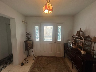 Charming 2 Bedroom + Study, 2 Bath Home in Premier 55+ Gated on On Top of the World Golf Course in Florida - for sale on GolfHomes.com, golf home, golf lot