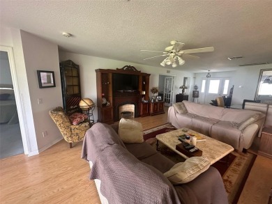 Charming 2 Bedroom + Study, 2 Bath Home in Premier 55+ Gated on On Top of the World Golf Course in Florida - for sale on GolfHomes.com, golf home, golf lot
