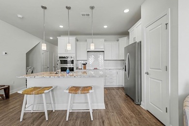 Discover exceptional coastal living in at The Townes at Barefoot on Barefoot Resort and Golf Club  in South Carolina - for sale on GolfHomes.com, golf home, golf lot