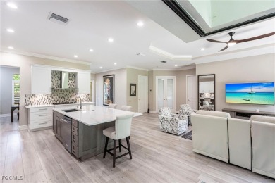 Exquisitely Renovated Home in the Verandah Gated Community. This on Verandah Golf Course and Club in Florida - for sale on GolfHomes.com, golf home, golf lot