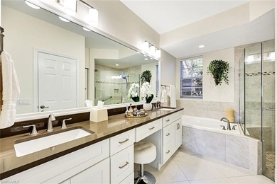 Wake up to tranquil south-facing lake views in this beautifully on Bonita Bay West in Florida - for sale on GolfHomes.com, golf home, golf lot