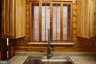 Discover the perfect blend of rustic charm and modern luxury in on Alpine Lake Resort in West Virginia - for sale on GolfHomes.com, golf home, golf lot