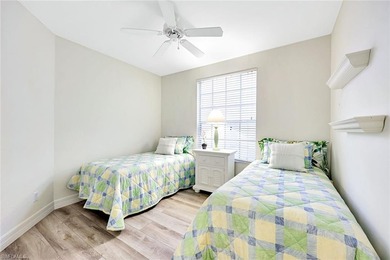 Wake up to tranquil south-facing lake views in this beautifully on Bonita Bay West in Florida - for sale on GolfHomes.com, golf home, golf lot