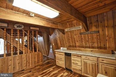 Discover the perfect blend of rustic charm and modern luxury in on Alpine Lake Resort in West Virginia - for sale on GolfHomes.com, golf home, golf lot