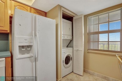 Discover your dream home in this beautiful 2BR, 2BA condo on Palm-Aire Country Club and Resort - Palms in Florida - for sale on GolfHomes.com, golf home, golf lot