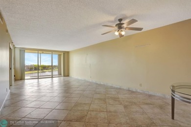 Discover your dream home in this beautiful 2BR, 2BA condo on Palm-Aire Country Club and Resort - Palms in Florida - for sale on GolfHomes.com, golf home, golf lot
