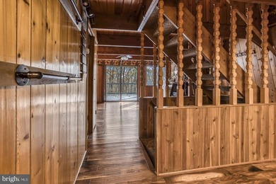 Discover the perfect blend of rustic charm and modern luxury in on Alpine Lake Resort in West Virginia - for sale on GolfHomes.com, golf home, golf lot