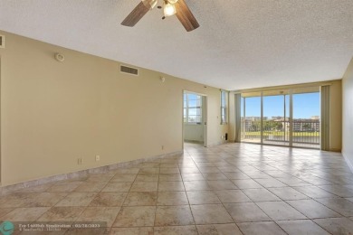 Discover your dream home in this beautiful 2BR, 2BA condo on Palm-Aire Country Club and Resort - Palms in Florida - for sale on GolfHomes.com, golf home, golf lot