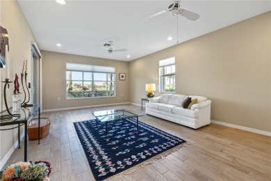 Experience the Florida lifestyle in this charming three-bedroom on Pelican Preserve Golf Club in Florida - for sale on GolfHomes.com, golf home, golf lot