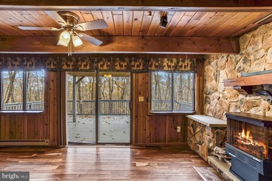 Discover the perfect blend of rustic charm and modern luxury in on Alpine Lake Resort in West Virginia - for sale on GolfHomes.com, golf home, golf lot