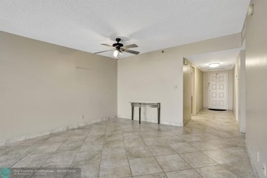 Discover your dream home in this beautiful 2BR, 2BA condo on Palm-Aire Country Club and Resort - Palms in Florida - for sale on GolfHomes.com, golf home, golf lot