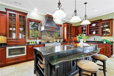 Nestled within prestigious Berkeley Hall, this custom-designed on Eagles Pointe Golf Club in South Carolina - for sale on GolfHomes.com, golf home, golf lot