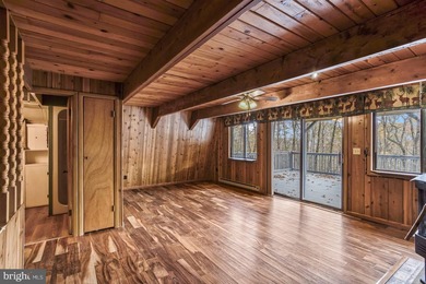 Discover the perfect blend of rustic charm and modern luxury in on Alpine Lake Resort in West Virginia - for sale on GolfHomes.com, golf home, golf lot