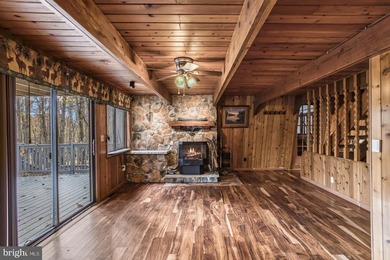 Discover the perfect blend of rustic charm and modern luxury in on Alpine Lake Resort in West Virginia - for sale on GolfHomes.com, golf home, golf lot