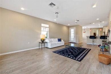 Experience the Florida lifestyle in this charming three-bedroom on Pelican Preserve Golf Club in Florida - for sale on GolfHomes.com, golf home, golf lot