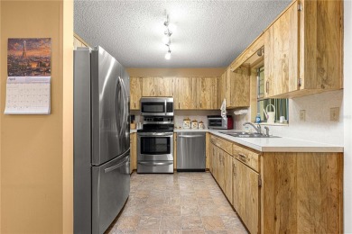 This charming well-maintained Philadelphian model villa is ready on On Top of the World Golf Course in Florida - for sale on GolfHomes.com, golf home, golf lot