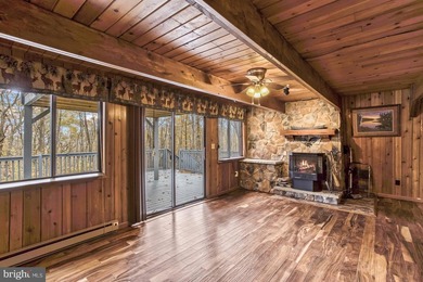 Discover the perfect blend of rustic charm and modern luxury in on Alpine Lake Resort in West Virginia - for sale on GolfHomes.com, golf home, golf lot