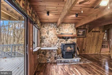 Discover the perfect blend of rustic charm and modern luxury in on Alpine Lake Resort in West Virginia - for sale on GolfHomes.com, golf home, golf lot