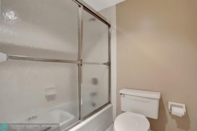 Discover your dream home in this beautiful 2BR, 2BA condo on Palm-Aire Country Club and Resort - Palms in Florida - for sale on GolfHomes.com, golf home, golf lot