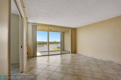 Discover your dream home in this beautiful 2BR, 2BA condo on Palm-Aire Country Club and Resort - Palms in Florida - for sale on GolfHomes.com, golf home, golf lot