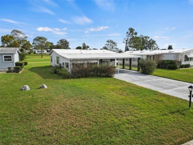 Wake up to breathtaking golf course views and embrace the active on Zellwood Station Country Club in Florida - for sale on GolfHomes.com, golf home, golf lot