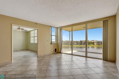 Discover your dream home in this beautiful 2BR, 2BA condo on Palm-Aire Country Club and Resort - Palms in Florida - for sale on GolfHomes.com, golf home, golf lot