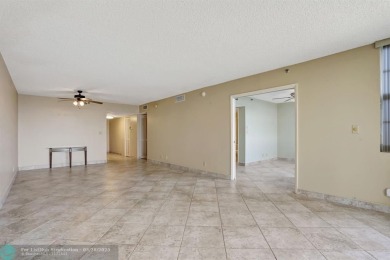 Discover your dream home in this beautiful 2BR, 2BA condo on Palm-Aire Country Club and Resort - Palms in Florida - for sale on GolfHomes.com, golf home, golf lot