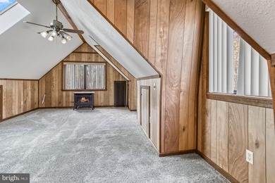 Discover the perfect blend of rustic charm and modern luxury in on Alpine Lake Resort in West Virginia - for sale on GolfHomes.com, golf home, golf lot