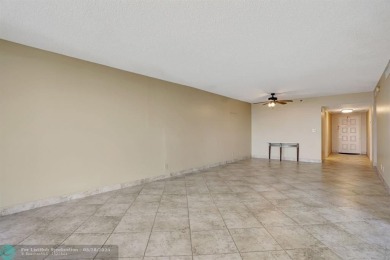 Discover your dream home in this beautiful 2BR, 2BA condo on Palm-Aire Country Club and Resort - Palms in Florida - for sale on GolfHomes.com, golf home, golf lot