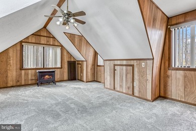 Discover the perfect blend of rustic charm and modern luxury in on Alpine Lake Resort in West Virginia - for sale on GolfHomes.com, golf home, golf lot