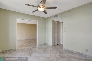 Discover your dream home in this beautiful 2BR, 2BA condo on Palm-Aire Country Club and Resort - Palms in Florida - for sale on GolfHomes.com, golf home, golf lot