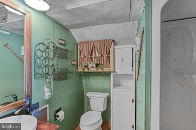 Discover the perfect blend of rustic charm and modern luxury in on Alpine Lake Resort in West Virginia - for sale on GolfHomes.com, golf home, golf lot