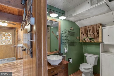 Discover the perfect blend of rustic charm and modern luxury in on Alpine Lake Resort in West Virginia - for sale on GolfHomes.com, golf home, golf lot