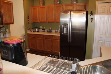 NEW TO THE MARKET: This 2 Bedroom, 2 Bath home with a Den is in on Plantation Golf Club in Florida - for sale on GolfHomes.com, golf home, golf lot