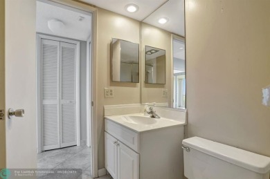 Discover your dream home in this beautiful 2BR, 2BA condo on Palm-Aire Country Club and Resort - Palms in Florida - for sale on GolfHomes.com, golf home, golf lot