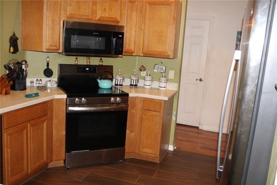 NEW TO THE MARKET: This 2 Bedroom, 2 Bath home with a Den is in on Plantation Golf Club in Florida - for sale on GolfHomes.com, golf home, golf lot