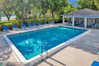 Discover your dream home in this beautiful 2BR, 2BA condo on Palm-Aire Country Club and Resort - Palms in Florida - for sale on GolfHomes.com, golf home, golf lot