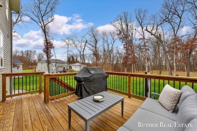 This Oak Harbor Preserve home is a treasure! Boasting 4 bedrooms on The Golf Club At Thornapple Pointe in Michigan - for sale on GolfHomes.com, golf home, golf lot