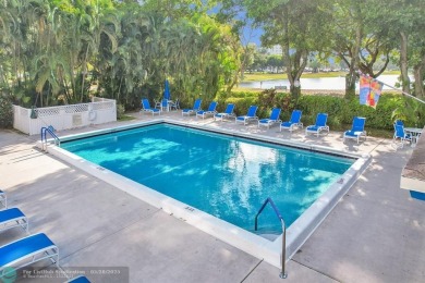 Discover your dream home in this beautiful 2BR, 2BA condo on Palm-Aire Country Club and Resort - Palms in Florida - for sale on GolfHomes.com, golf home, golf lot