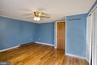 Discover the perfect blend of rustic charm and modern luxury in on Alpine Lake Resort in West Virginia - for sale on GolfHomes.com, golf home, golf lot