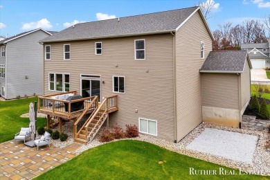 This Oak Harbor Preserve home is a treasure! Boasting 4 bedrooms on The Golf Club At Thornapple Pointe in Michigan - for sale on GolfHomes.com, golf home, golf lot