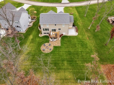 This Oak Harbor Preserve home is a treasure! Boasting 4 bedrooms on The Golf Club At Thornapple Pointe in Michigan - for sale on GolfHomes.com, golf home, golf lot