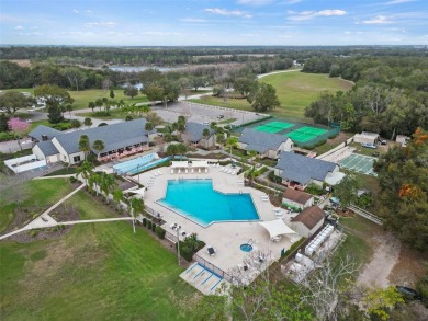 Wake up to breathtaking golf course views and embrace the active on Zellwood Station Country Club in Florida - for sale on GolfHomes.com, golf home, golf lot