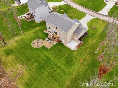 This Oak Harbor Preserve home is a treasure! Boasting 4 bedrooms on The Golf Club At Thornapple Pointe in Michigan - for sale on GolfHomes.com, golf home, golf lot