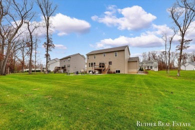 This Oak Harbor Preserve home is a treasure! Boasting 4 bedrooms on The Golf Club At Thornapple Pointe in Michigan - for sale on GolfHomes.com, golf home, golf lot