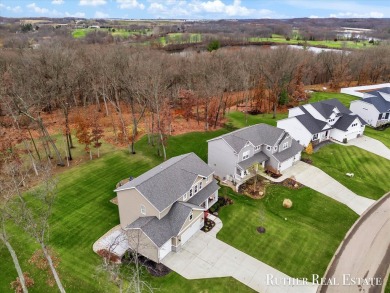 This Oak Harbor Preserve home is a treasure! Boasting 4 bedrooms on The Golf Club At Thornapple Pointe in Michigan - for sale on GolfHomes.com, golf home, golf lot