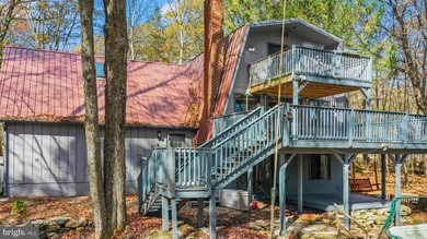 Discover the perfect blend of rustic charm and modern luxury in on Alpine Lake Resort in West Virginia - for sale on GolfHomes.com, golf home, golf lot